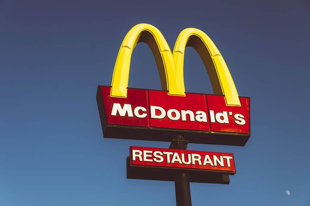 photo shows McDonald’s golden arches as example of initials used in brand logos