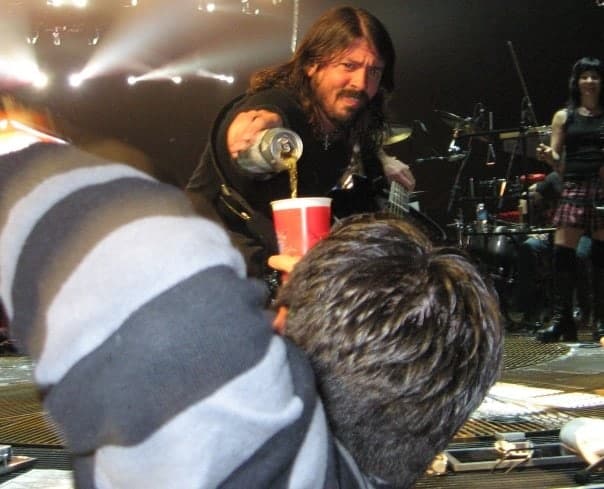 Dave Grohl pouring a beer